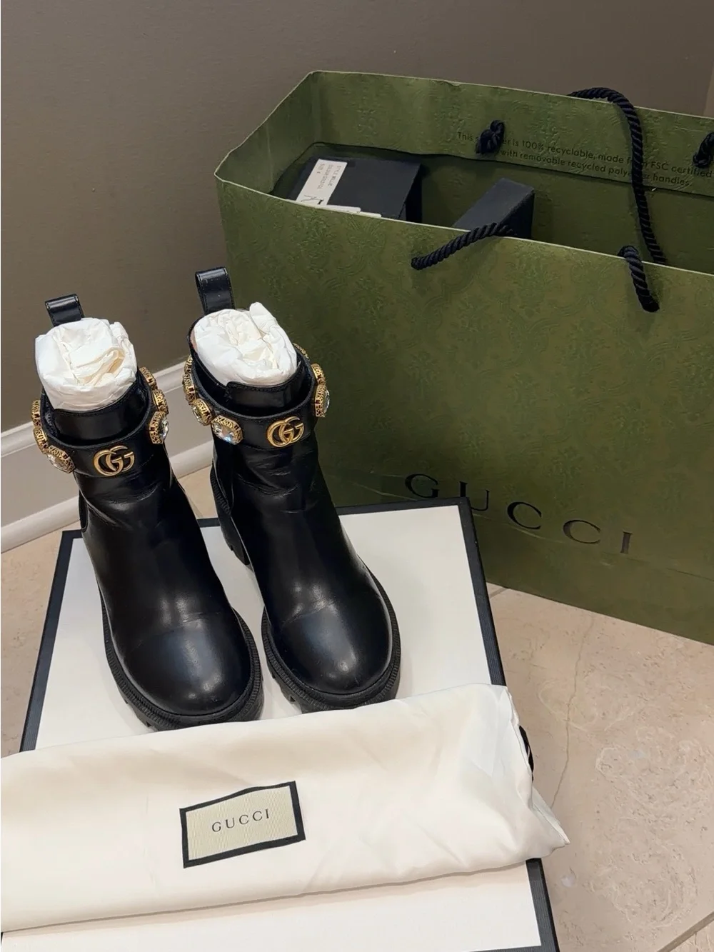 Gucci Black Leather Ankle Boots with Gold GG Buckle and Jewel Accents
